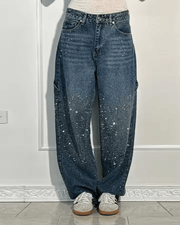 Women's retro flared trousers with a glittery sheen