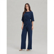 Tweedelige set dames met gedrapeerde top en wijde broek