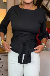 Top dames met strikdetail in de taille en 3/4 mouw