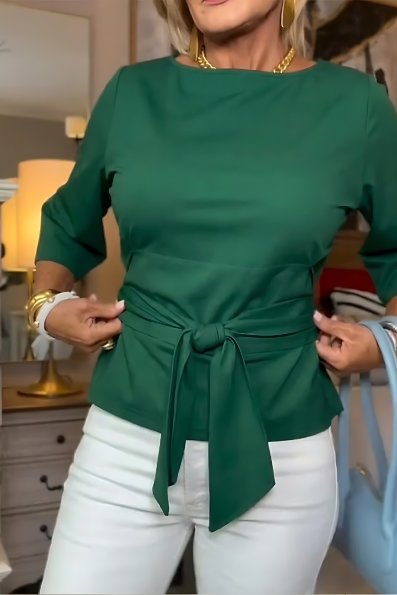 Top dames met strikdetail in de taille en 3/4 mouw