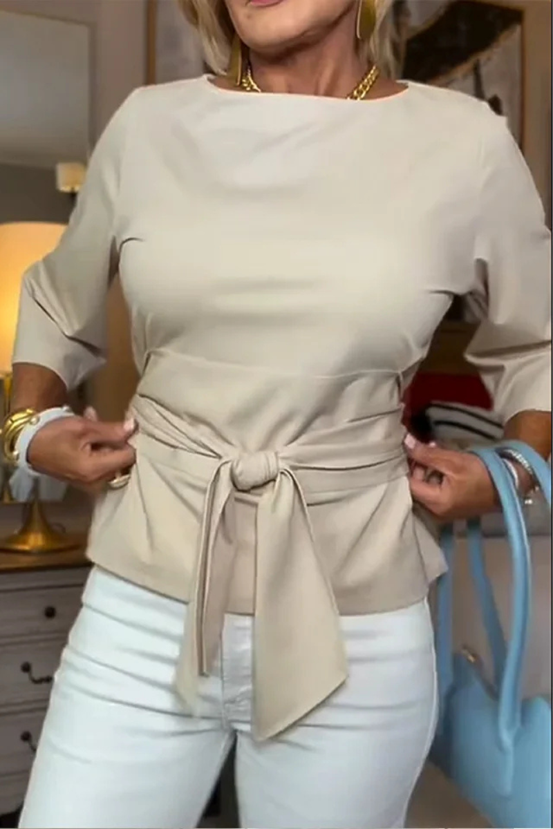 Top dames met strikdetail in de taille en 3/4 mouw