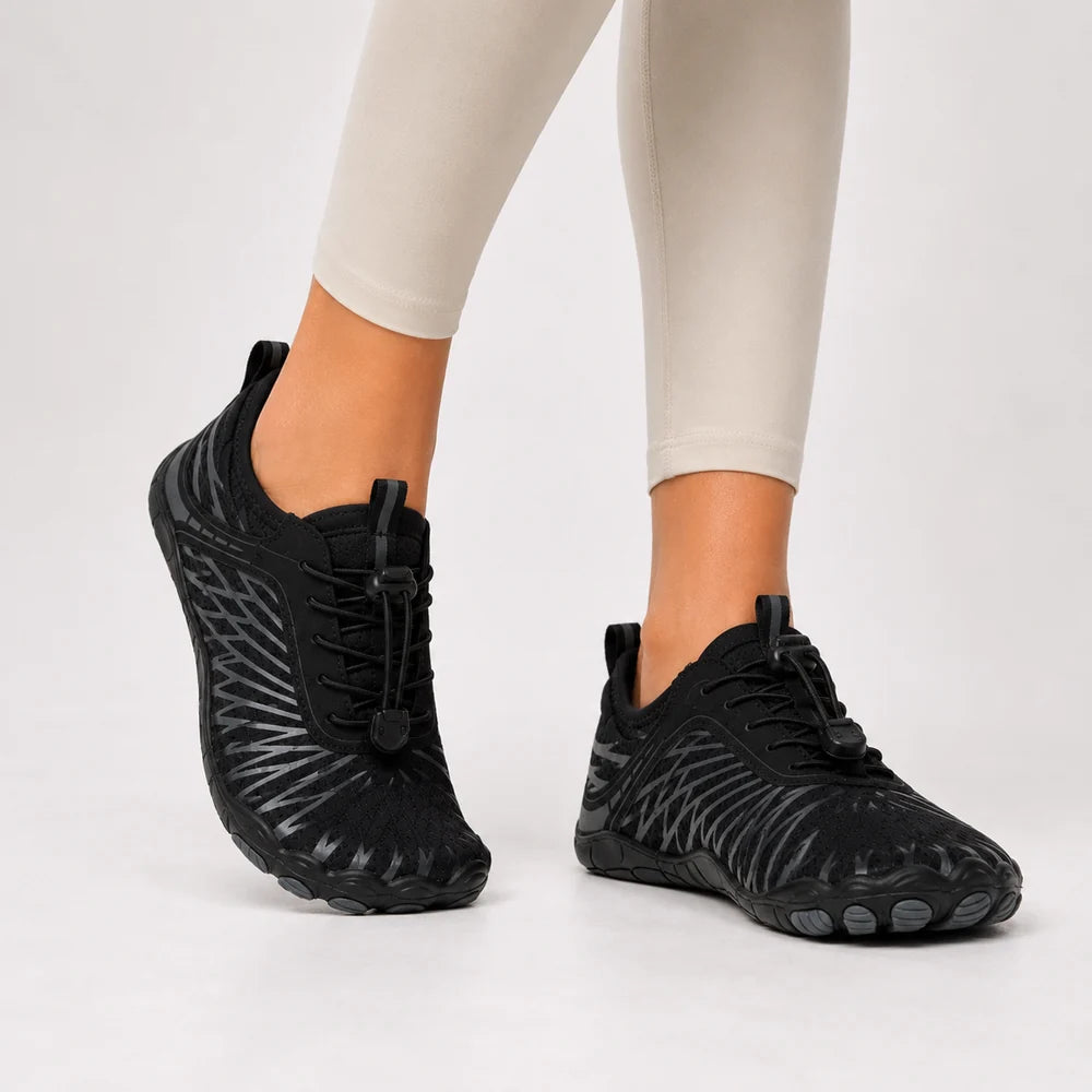 black women's barefoot walking shoes with laces and a breathable treaded sole