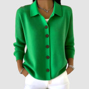 Dames gebreid vest in groen, kraag met knoopsluiting, lange mouwen, ronde knopen.