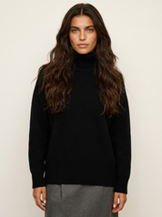 A plain black women's knitted roll-neck jumper with long sleeves