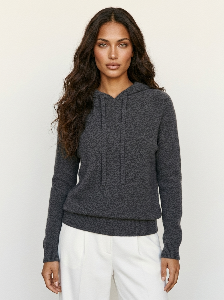 A dark-grey women's knitted hoodie with a drawstring hood and ribbed hem