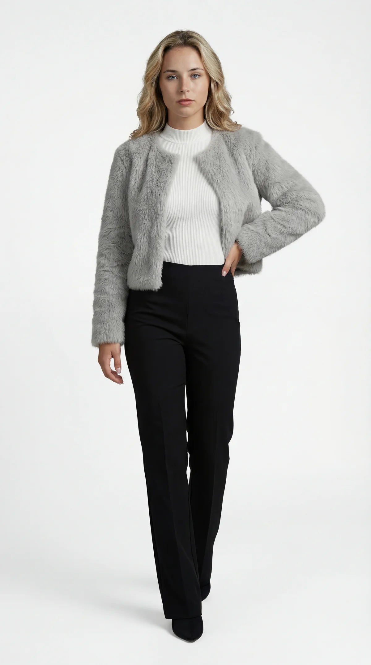 A cropped grey furry jacket with an open front and long sleeves