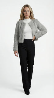 A cropped grey furry jacket with an open front and long sleeves