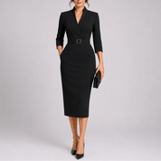 A black V-neck midi dress with a buckled waist belt and three-quarter sleeves