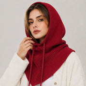 A women's knitted balaclava with a hood and drawstring