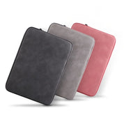 A leather laptop sleeve with a water-resistant finish for a tablet or computer