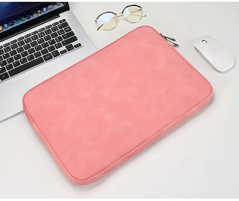 A leather laptop sleeve with a water-resistant finish for a tablet or computer