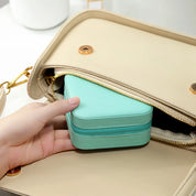 Portable jewellery box for rings and necklaces