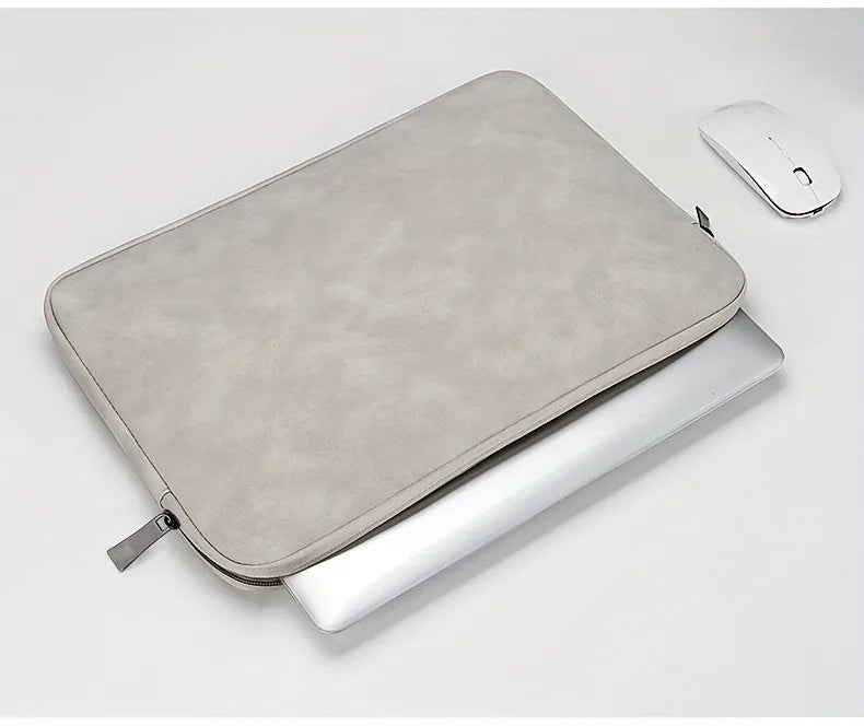 A leather laptop sleeve with a water-resistant finish for a tablet or computer