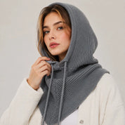 A women's knitted balaclava with a hood and drawstring