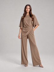 Tweedelige set dames met gedrapeerde top en wijde broek