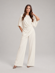 Tweedelige set dames met gedrapeerde top en wijde broek