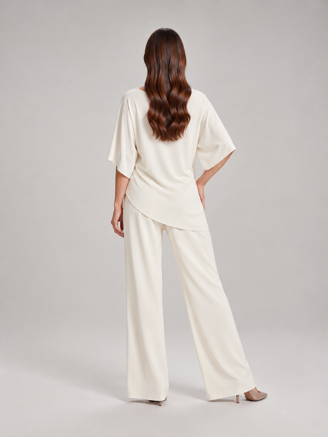 Tweedelige set dames met gedrapeerde top en wijde broek