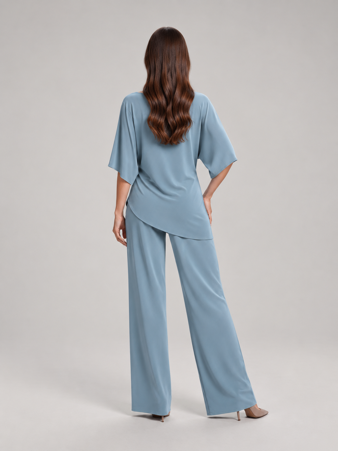 Tweedelige set dames met gedrapeerde top en wijde broek