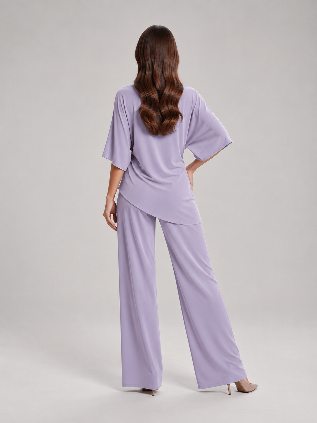 Tweedelige set dames met gedrapeerde top en wijde broek