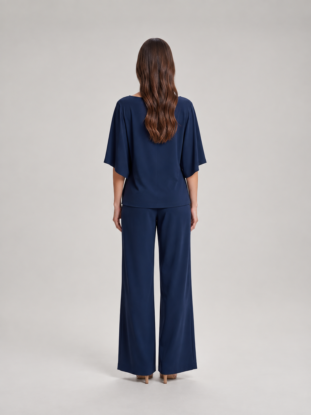 Tweedelige set dames met gedrapeerde top en wijde broek