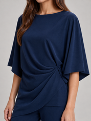 Tweedelige set dames met gedrapeerde top en wijde broek