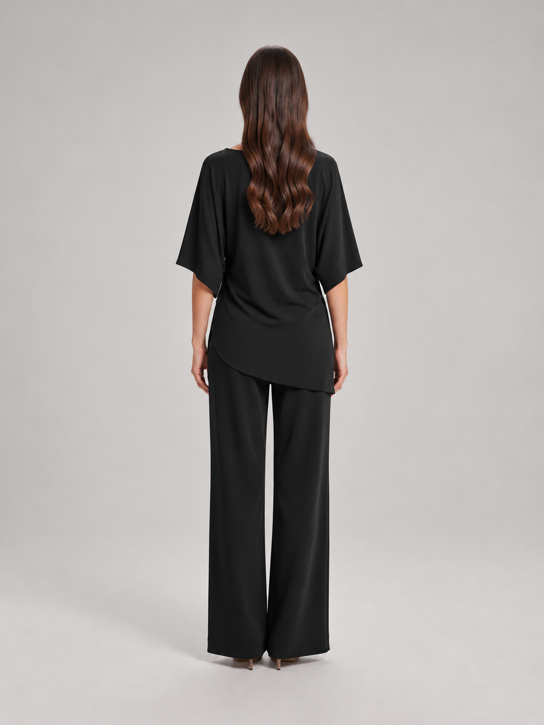 Tweedelige set dames met gedrapeerde top en wijde broek