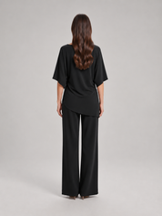 Tweedelige set dames met gedrapeerde top en wijde broek