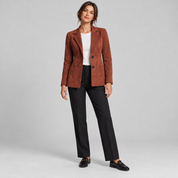 Women's brown fitted blazer with lining and pockets, worn by a female model, front view