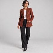 Women's brown fitted blazer with lining and pockets, worn by a female model, angled front view