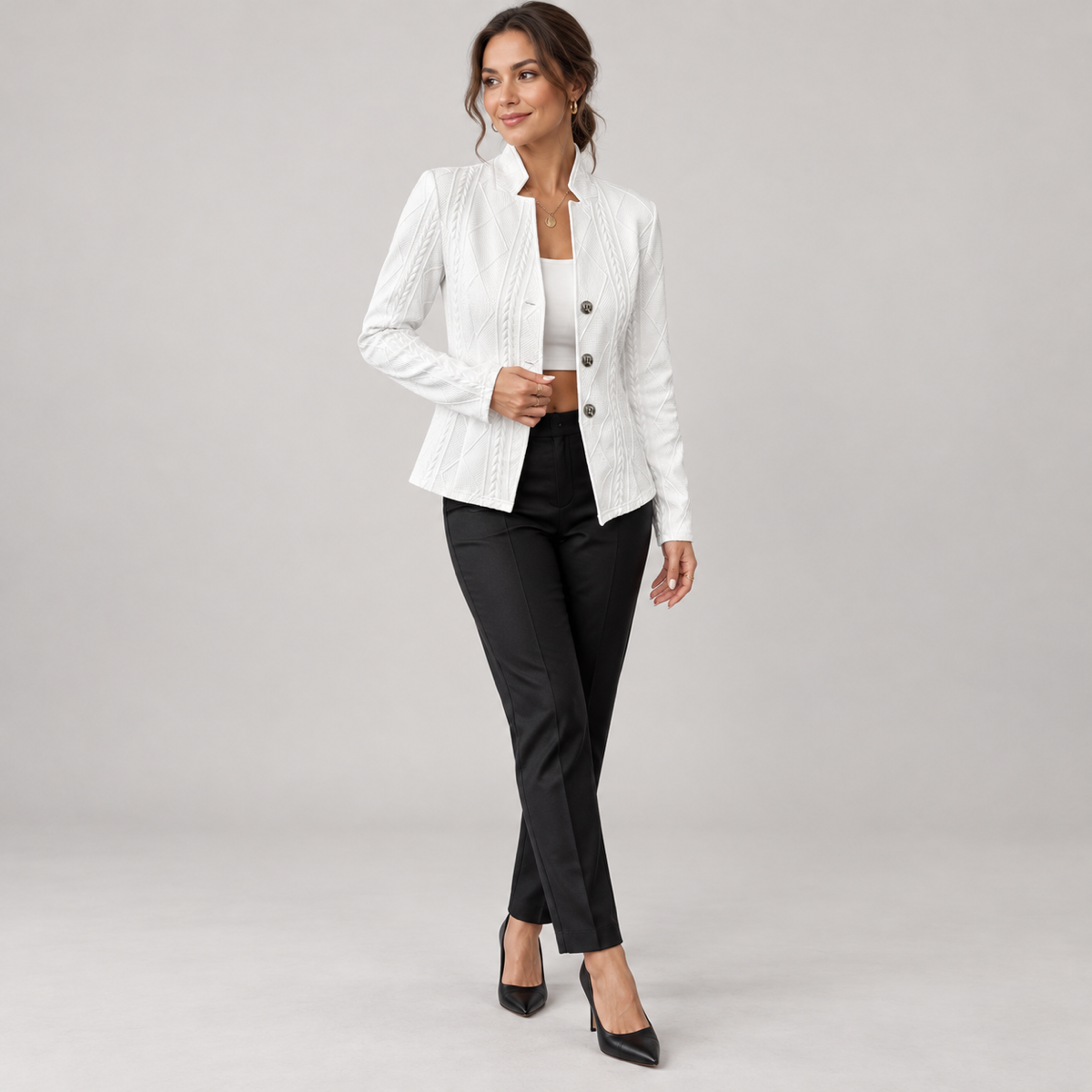 Women’s blazer with cable-knit pattern and stand-up collar, worn by a female model, angled front view