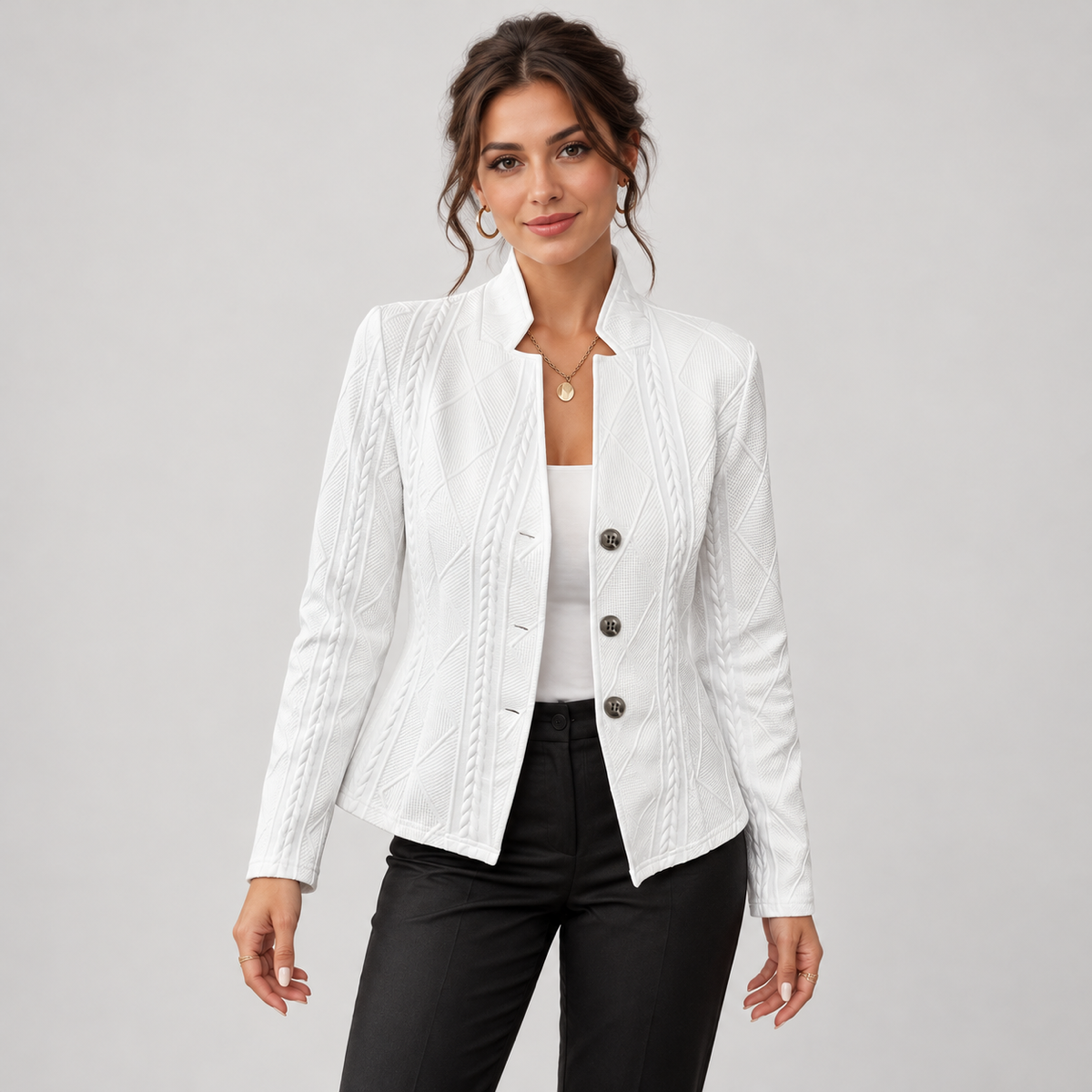 Women’s blazer with cable-knit pattern and stand-up collar, worn by a female model, close-up