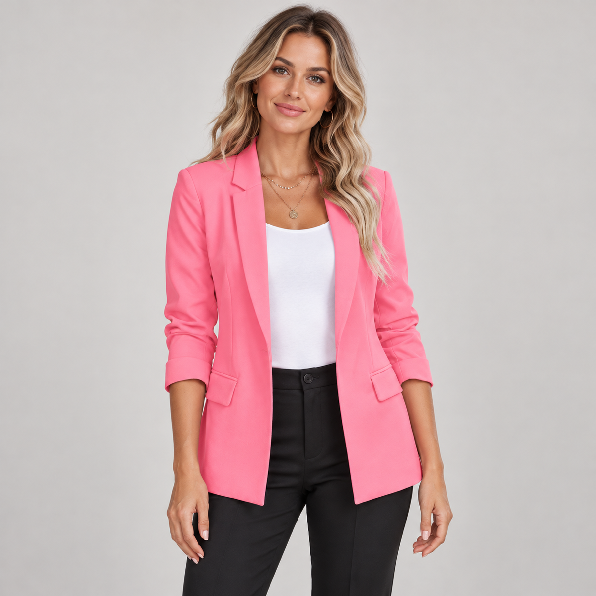 Women's slim-fit blazer with a tailored cut and lapels, worn by a female model, close-up