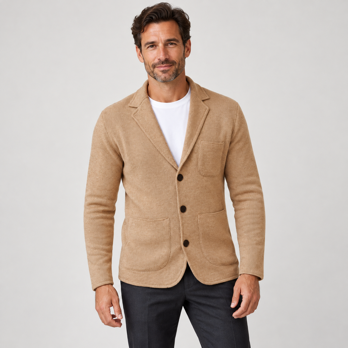 Men's jumper-look robe with lapels and buttons, worn by a male model, close-up