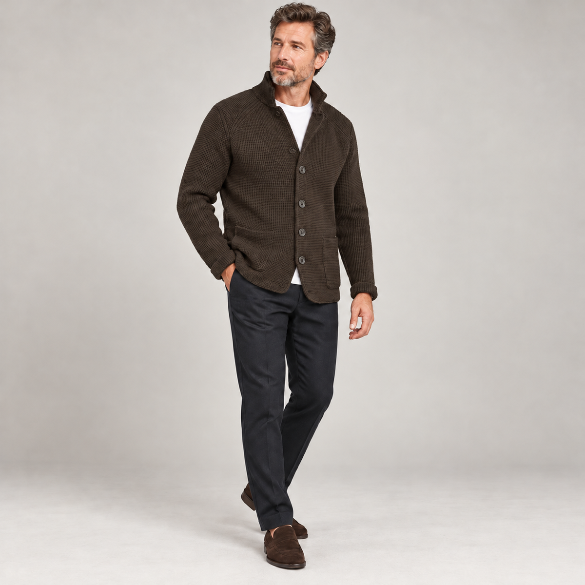 Men’s classic waistcoat with button closure, worn by a male model, angled front view