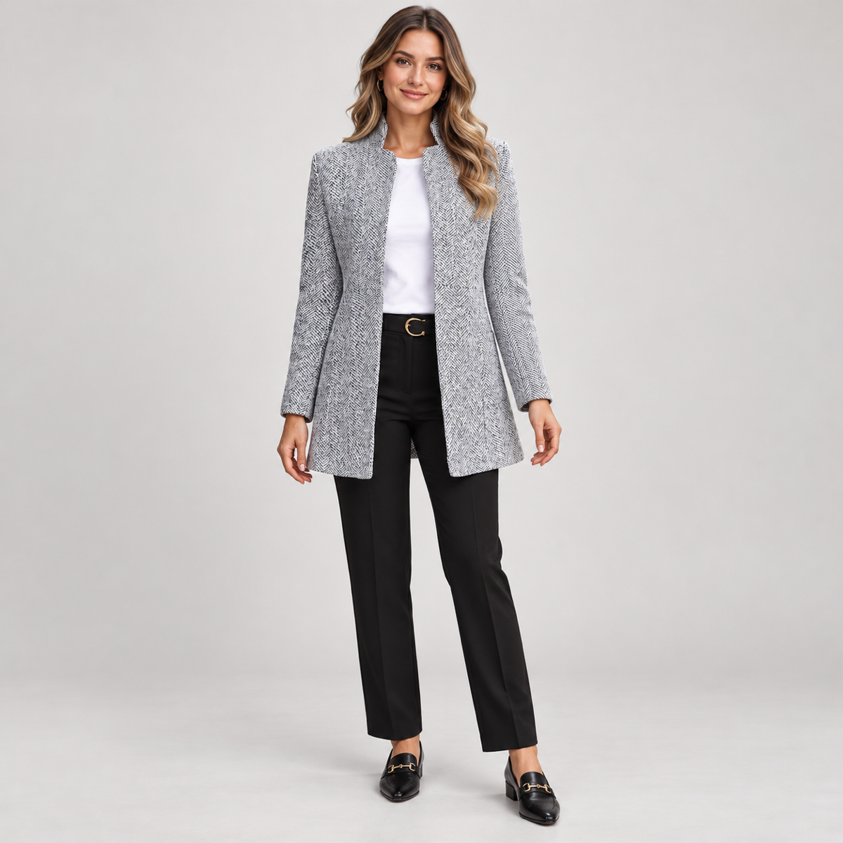 Women's long grey blazer with a stand-up collar, worn by a female model, front view
