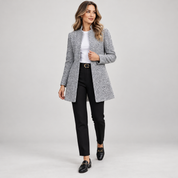 Women's long grey blazer with a stand-up collar, worn by a female model, angled front view