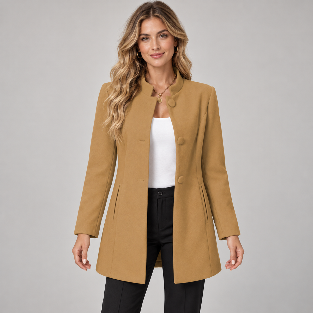 Long women’s collarless open-front blazer, worn by a female model, close-up