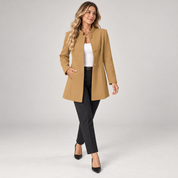 Long women’s collarless open-front blazer, worn by a female model in a walking pose