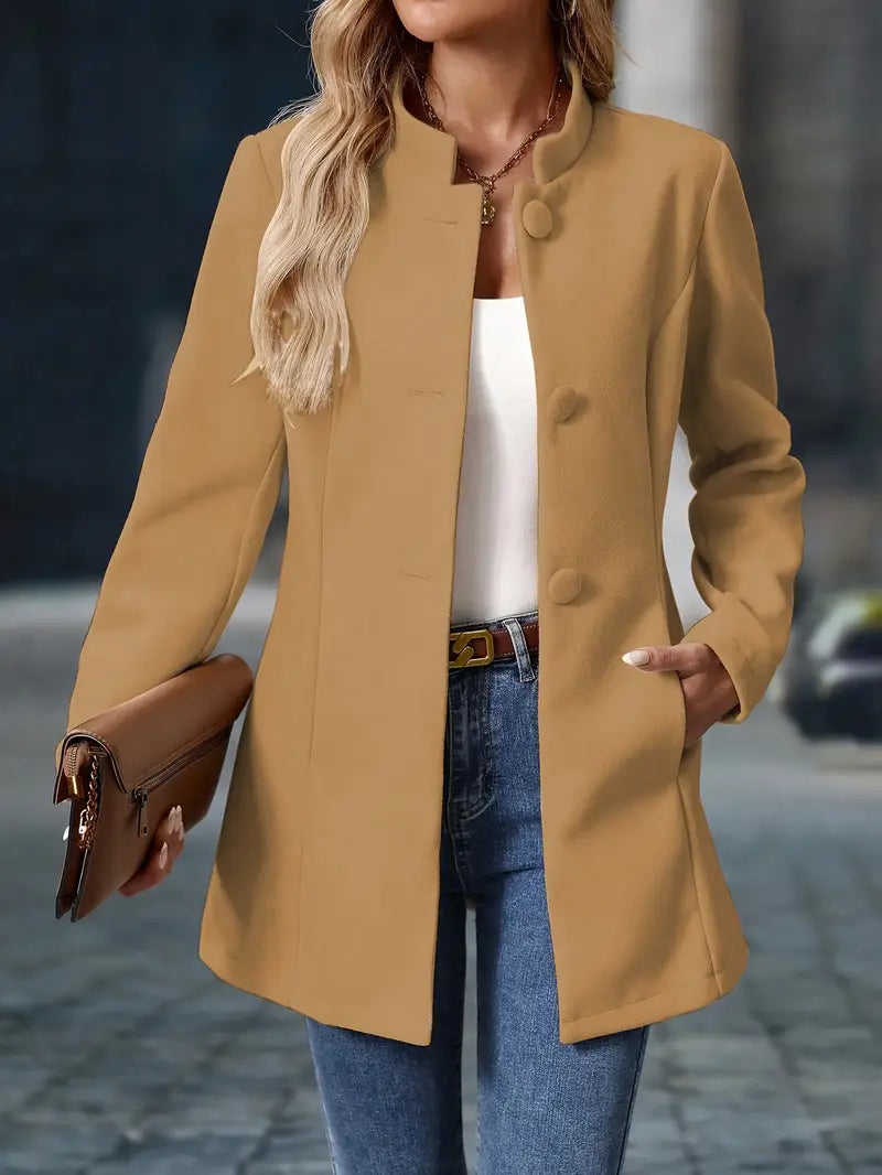 Long women’s collarless open-front blazer