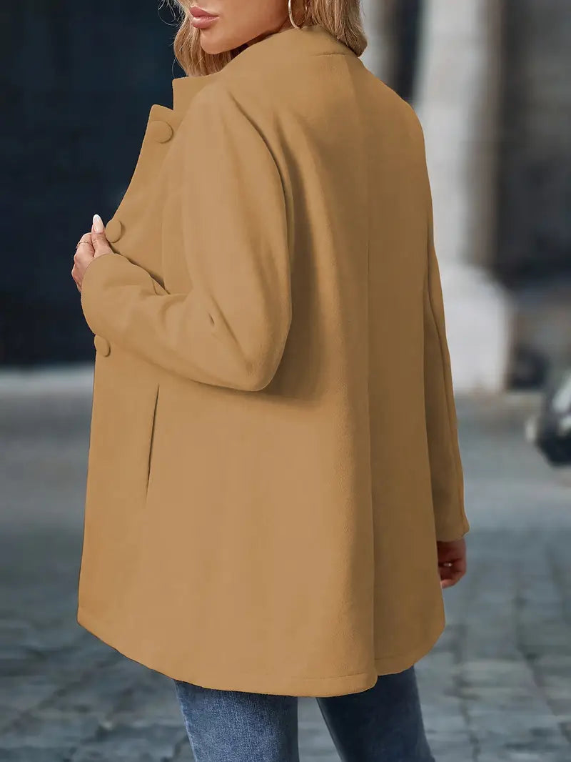 Long women’s collarless open-front blazer