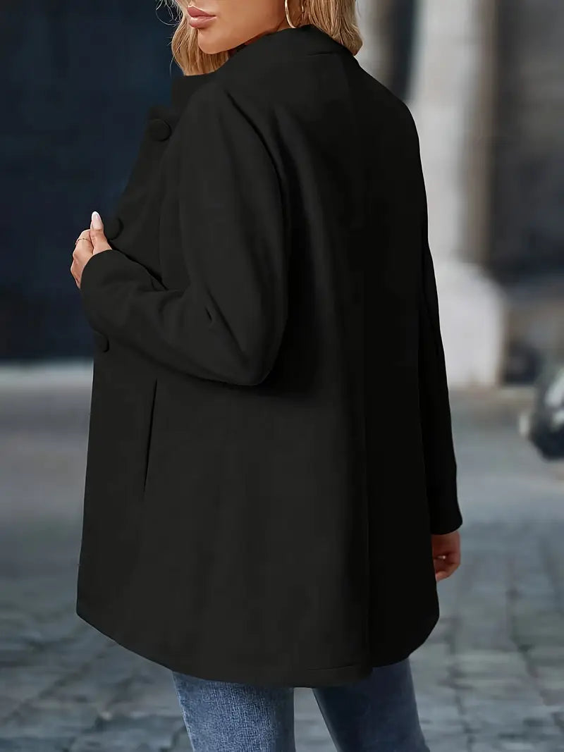 Long women’s collarless open-front blazer