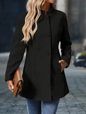 Long women’s collarless open-front blazer