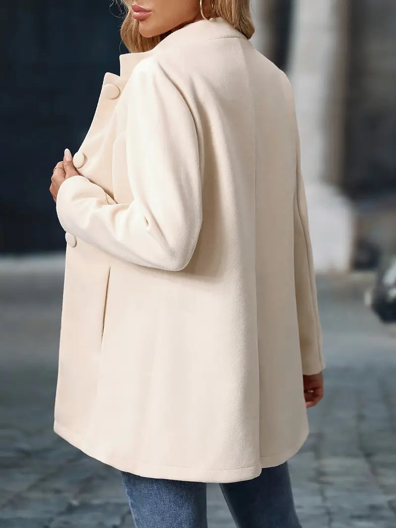 Long women’s collarless open-front blazer