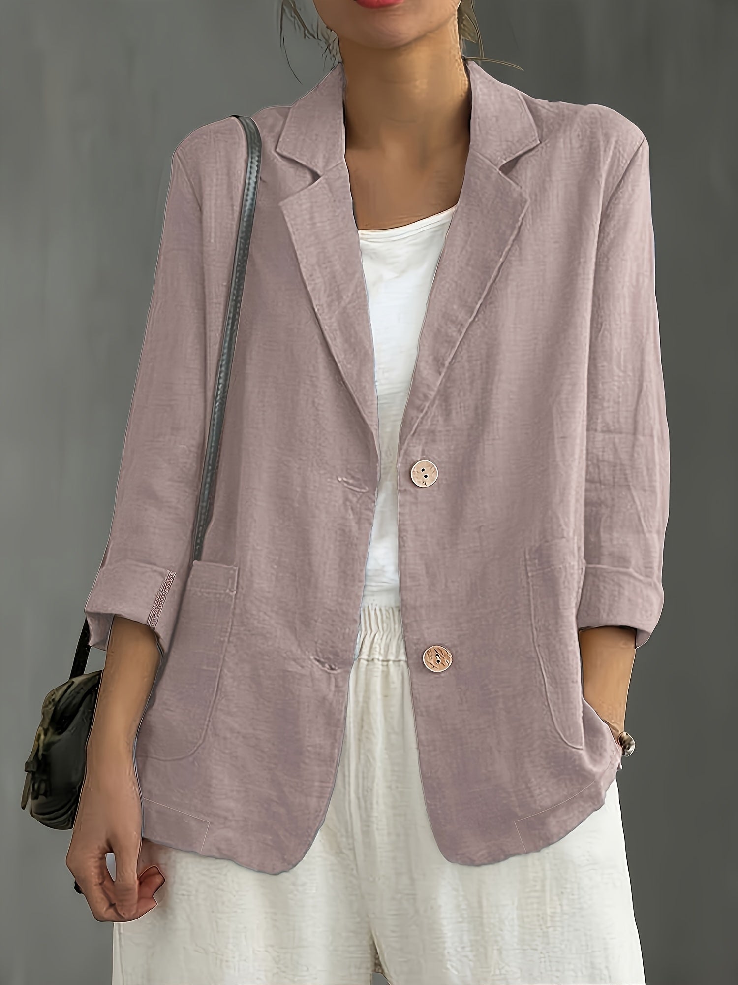 Women's loose-fit blazer with two buttons and roll-up sleeves