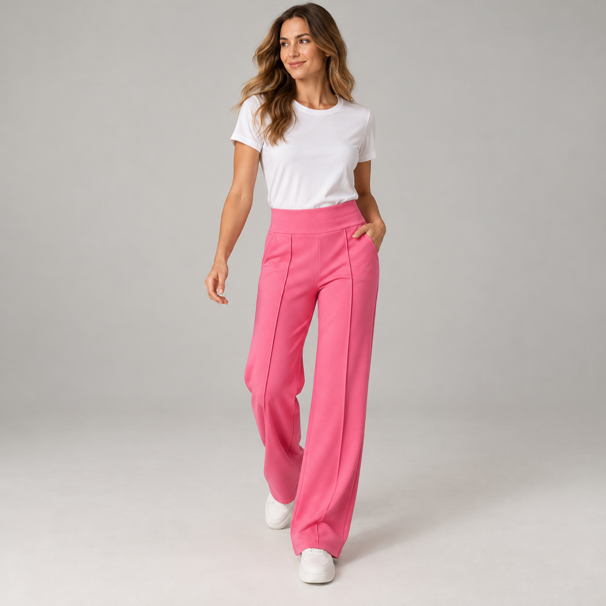 Wide leg pantalon dames high waist met soepele val op damesmodel, in een lopende pose