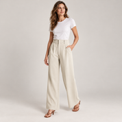 Wijde pantalon dames met hoge taille smart casual op damesmodel, schuin vooraanzicht