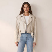Women's cropped faux leather jacket with belt and asymmetric zip in beige