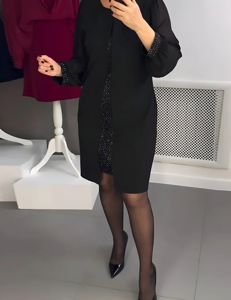 Women's fitted dress with sheer long sleeves and glitter underlay