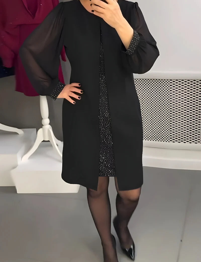 Women's fitted dress with sheer long sleeves and glitter underlay in black