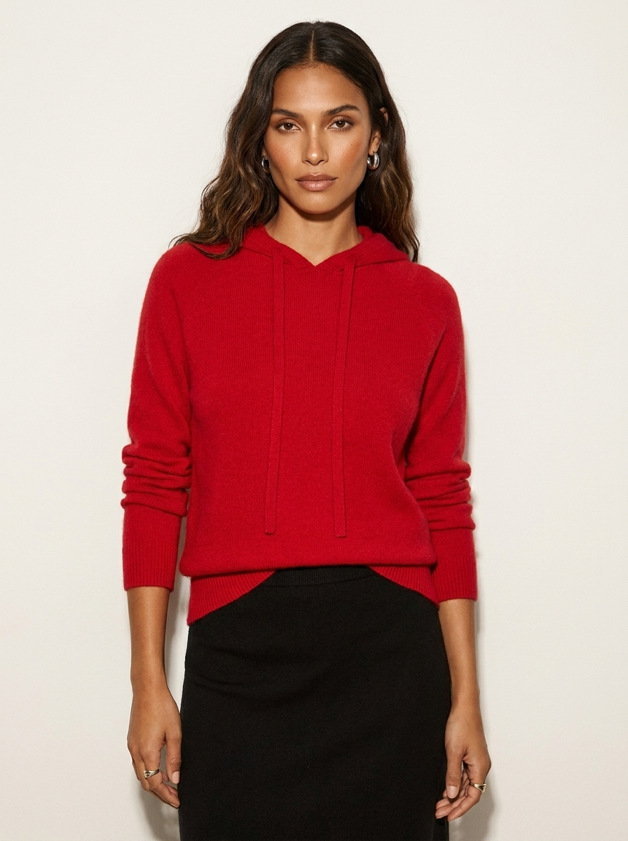 A women's knitted hoodie with a drawstring hood, red jersey texture and long sleeves